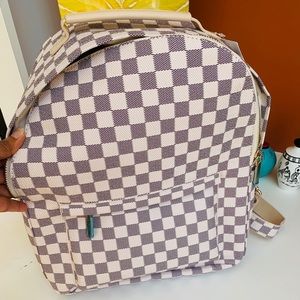 Cream checkered backpack